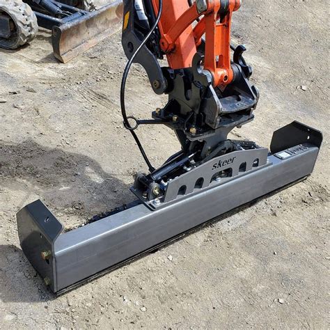 mini digger grading beam|skeer grading beam tilting.